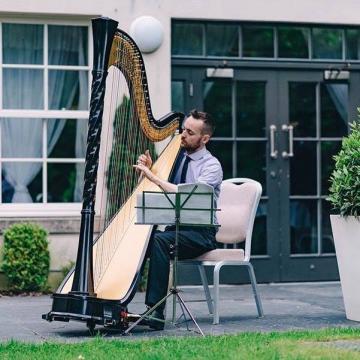 - Tomos Harpist
