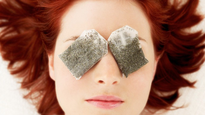 green tea bags on eyes