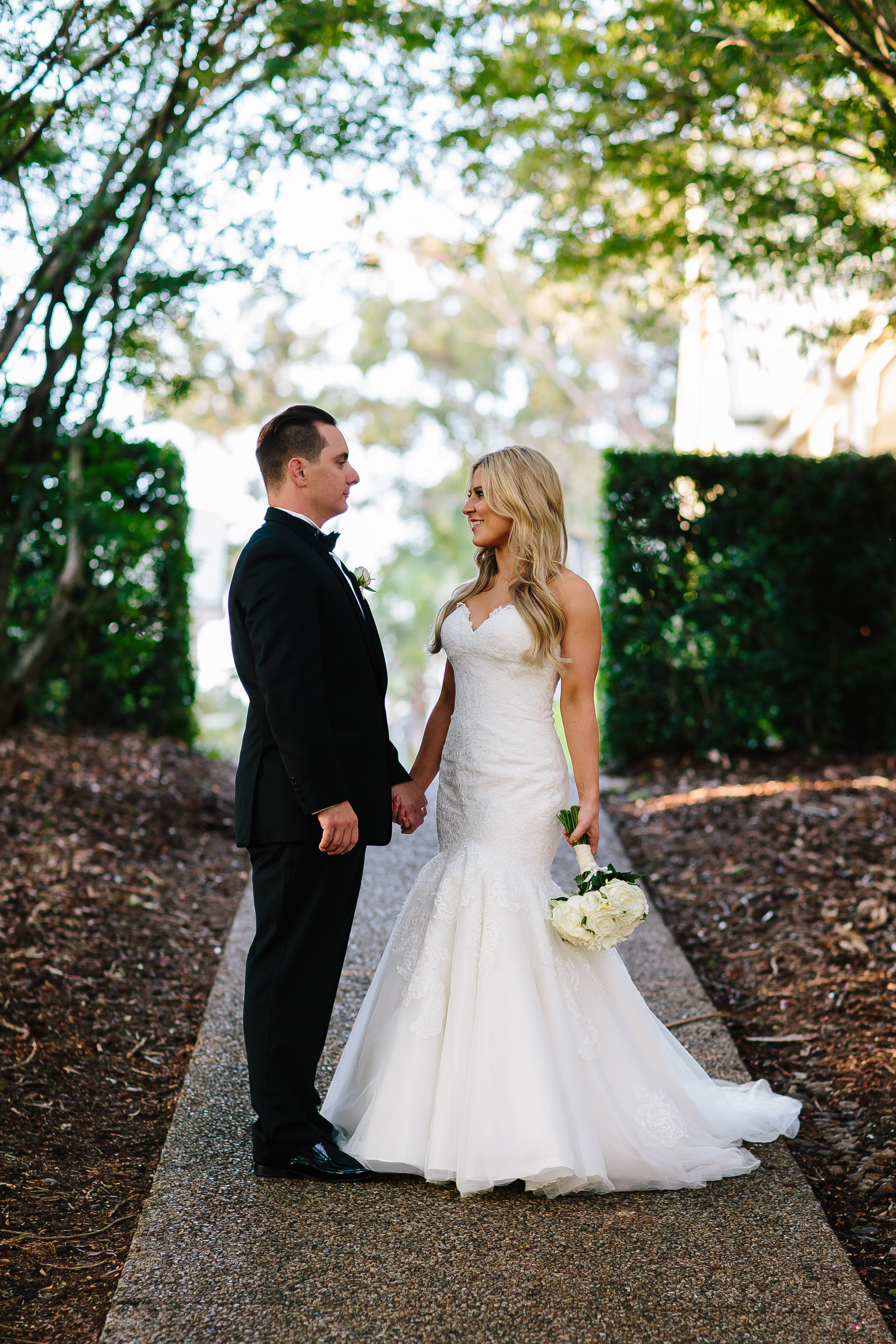 Bec and Callum tied the knot in a gorgeous ceremony at the Intercontinental Cove Sanctuary Hotel in 2018. This beautiful wedding followed a classy and modern theme that was full of romance. We sat down with Bec, the lovely bride, to find out a little bit more about their love story and big day! Take a look into this gorgeous glass chapel wedding…